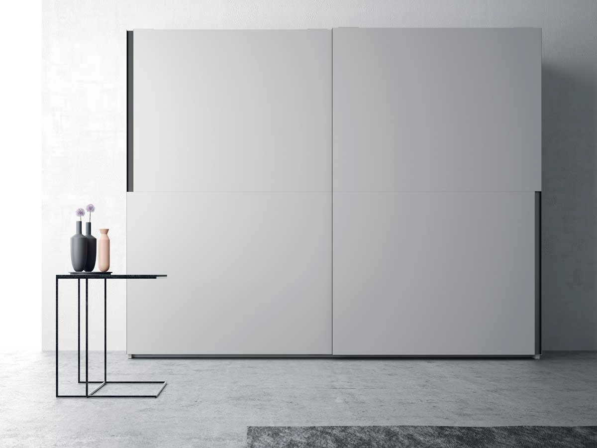 Sliding wardrobe designers in Gurgaon - glass finish wardrobe by Innovante Studio